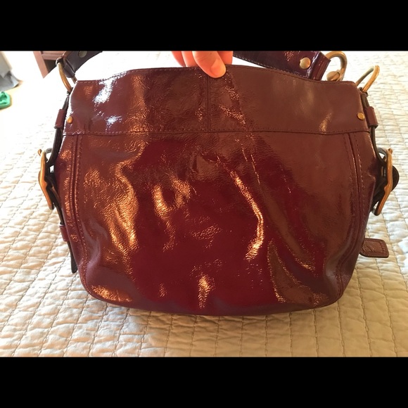 Plum colored patent leather Coach purse - Picture 4 of 8